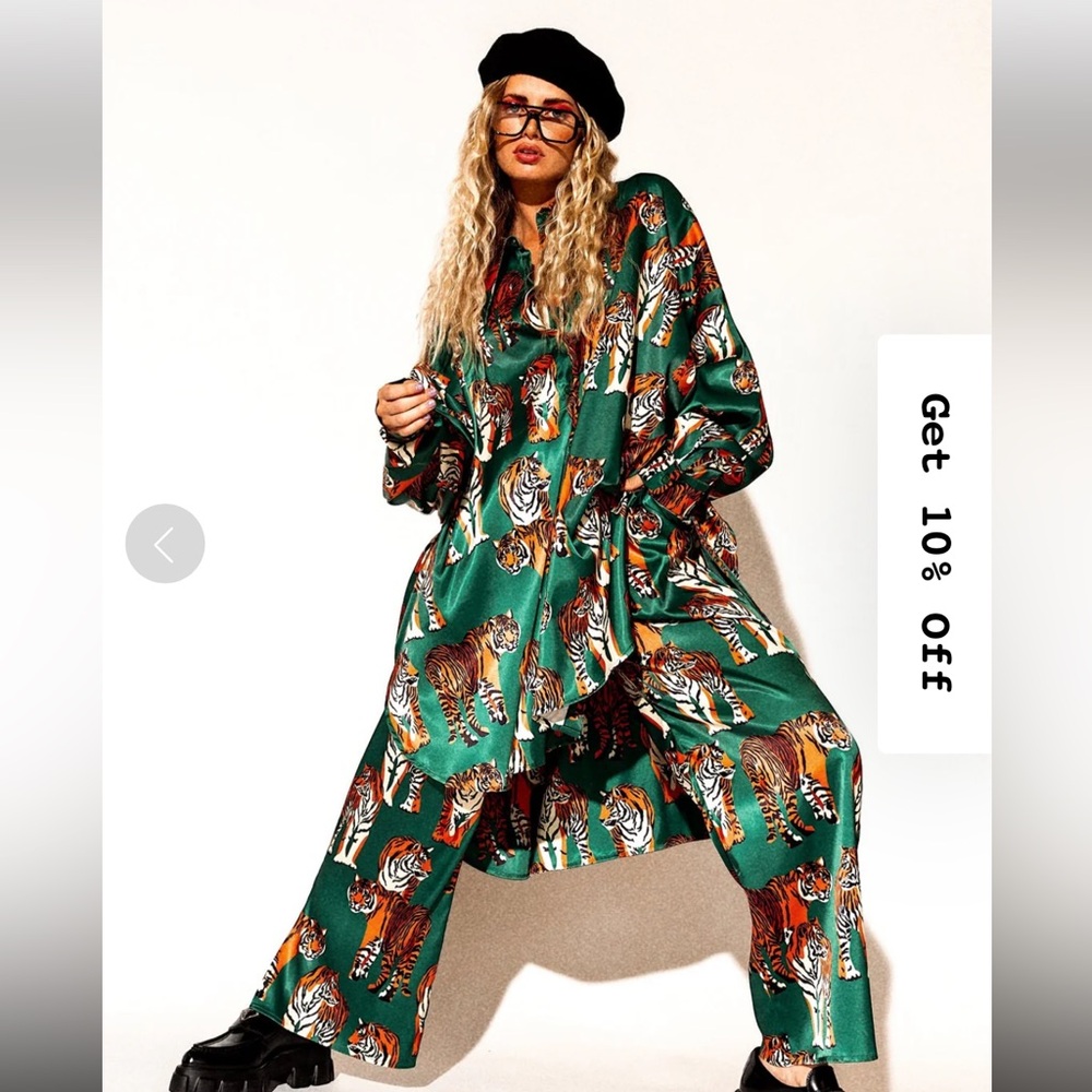 Dressed in LaLa pantsuit size L/XL new with tags.
